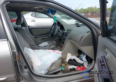 2001 Nissan Maxima Gle из США, поврежденный, VIN JN1CA31A21T111249